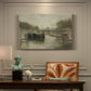 Canvas art print featuring a hazy bridge over water in a muted atmospheric landscape, presented within a refined interior setting