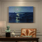 Canvas art print featuring fishing boats resting in harbor under moonlit sky, presented within a refined interior setting
