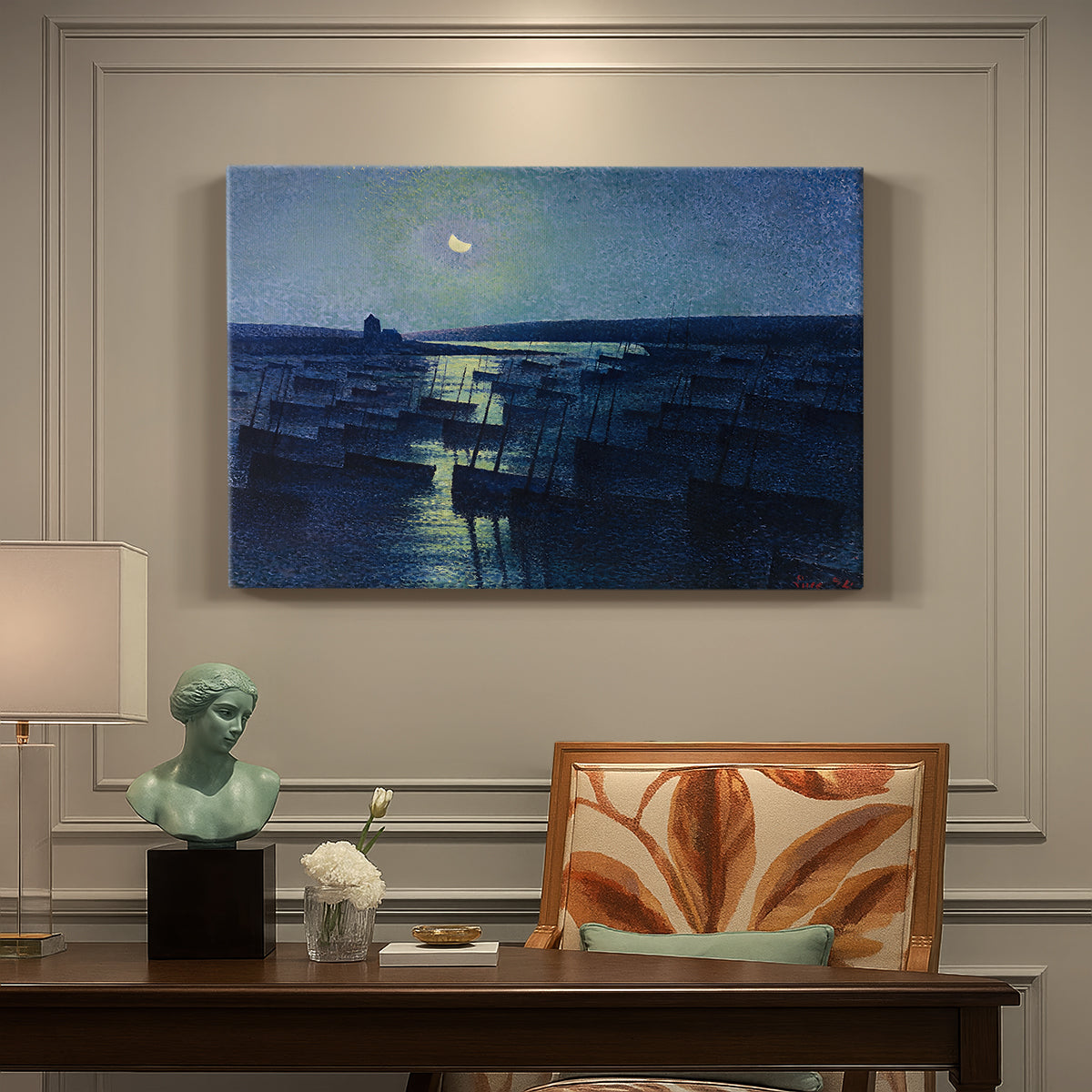 Canvas art print featuring fishing boats resting in harbor under moonlit sky, presented within a refined interior setting