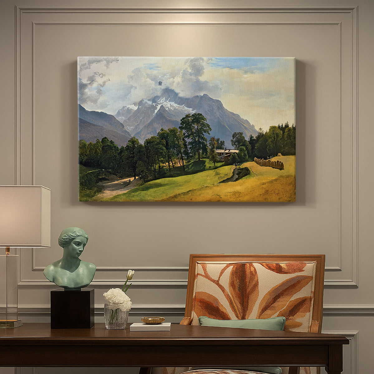 Canvas art print featuring an alpine mountain landscape with towering peaks and valley below, presented within a refined interior setting