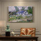 Canvas art print featuring village houses clustered along road with surrounding greenery under open sky, presented within a refined interior setting