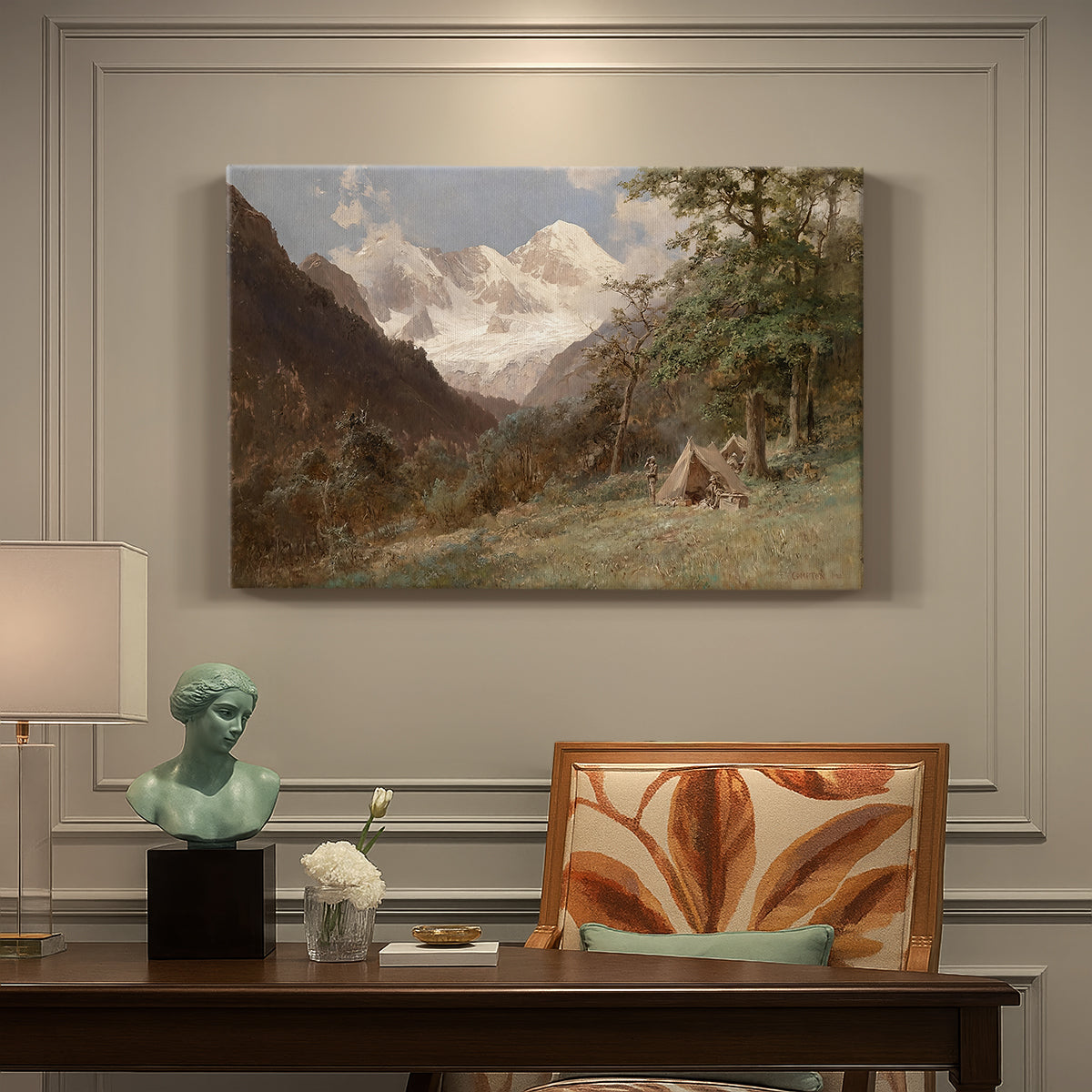 Canvas art print featuring a mountainous landscape with rugged terrain and distant peaks, presented within a refined interior setting