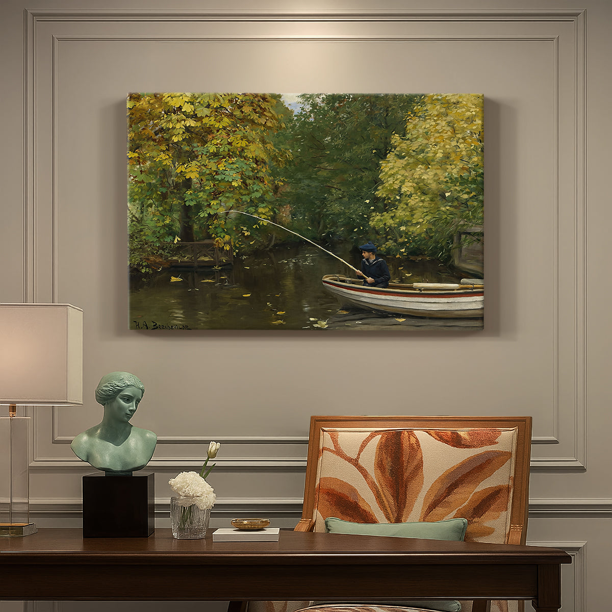 Canvas art print featuring a young boy fishing beside calm water surrounded by greenery, presented within a refined interior setting