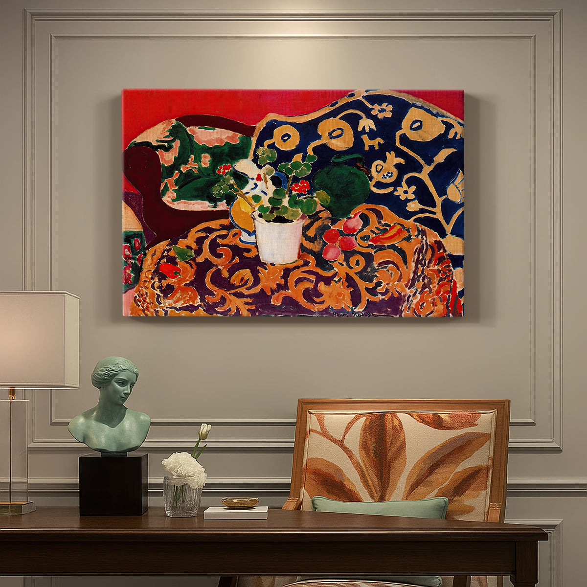 Canvas art print featuring a vibrant still life with fruit, vessels, and patterned objects on a table, presented within a refined interior setting