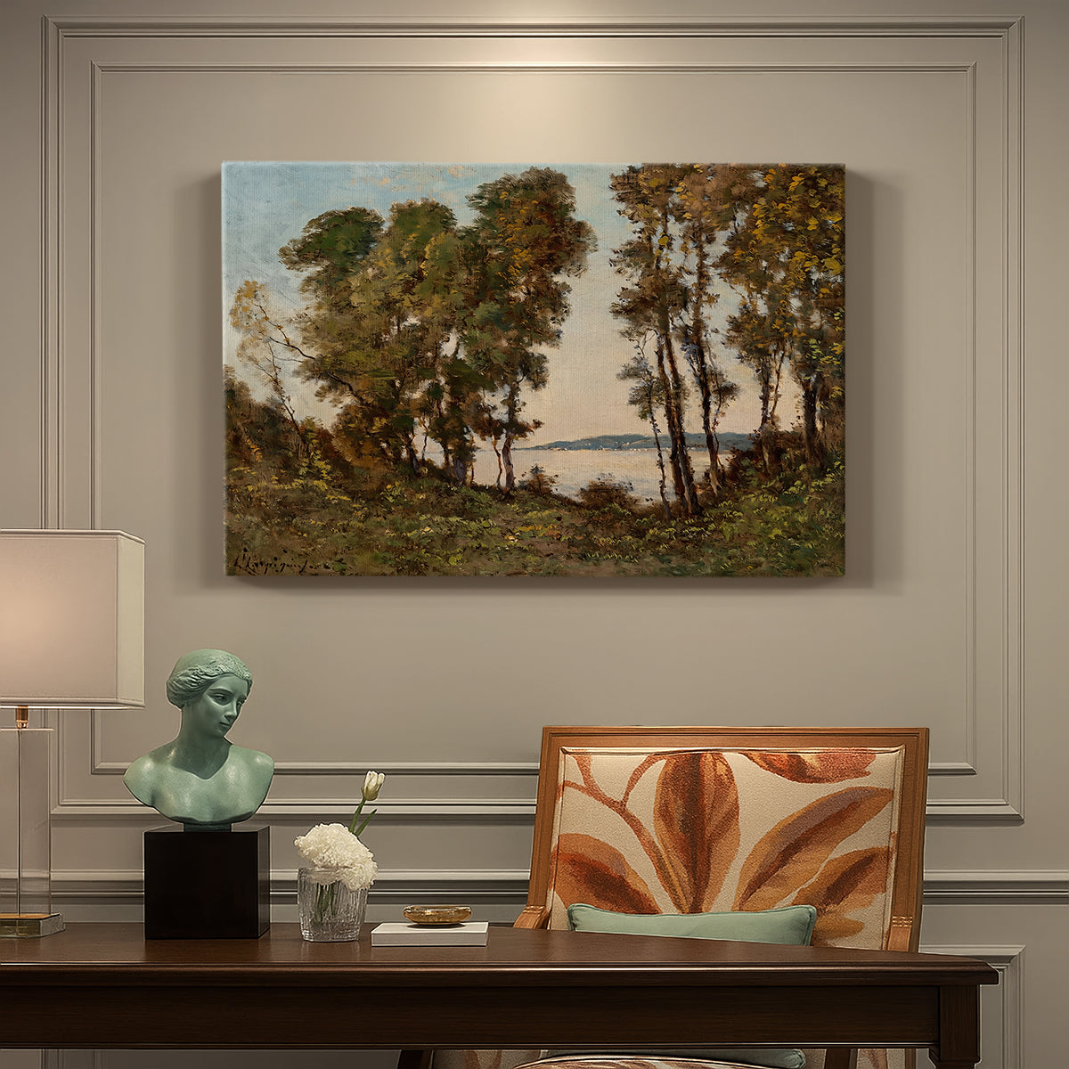 Canvas art print featuring a riverbank lined with trees and vegetation beside calm flowing water, presented within a refined interior setting