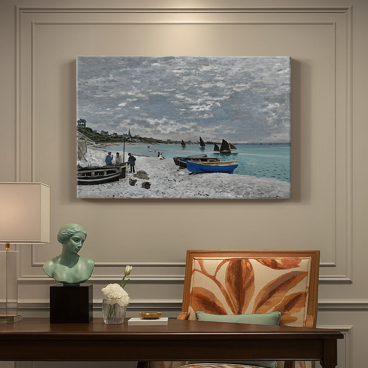 Canvas art print featuring a seaside promenade with figures, flags, and boats along the coast, presented within a refined interior setting