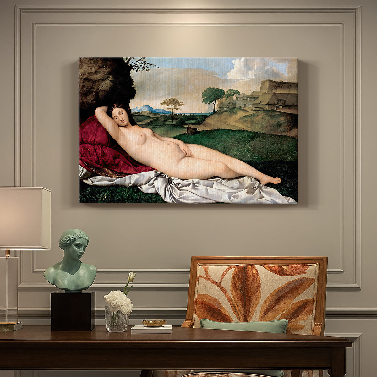 Canvas art print featuring a nude woman reclining asleep in open landscape with soft hills behind, presented within a refined interior setting