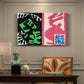 Canvas art print featuring an abstract collage of bold black and red shapes in dynamic arrangement, presented within a refined interior setting