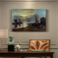 Canvas art print featuring a sunrise over harbor with fishermen working among boats, presented within a refined interior setting