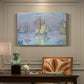 Canvas art print featuring a boat with yellow sail on water, presented within a refined interior setting