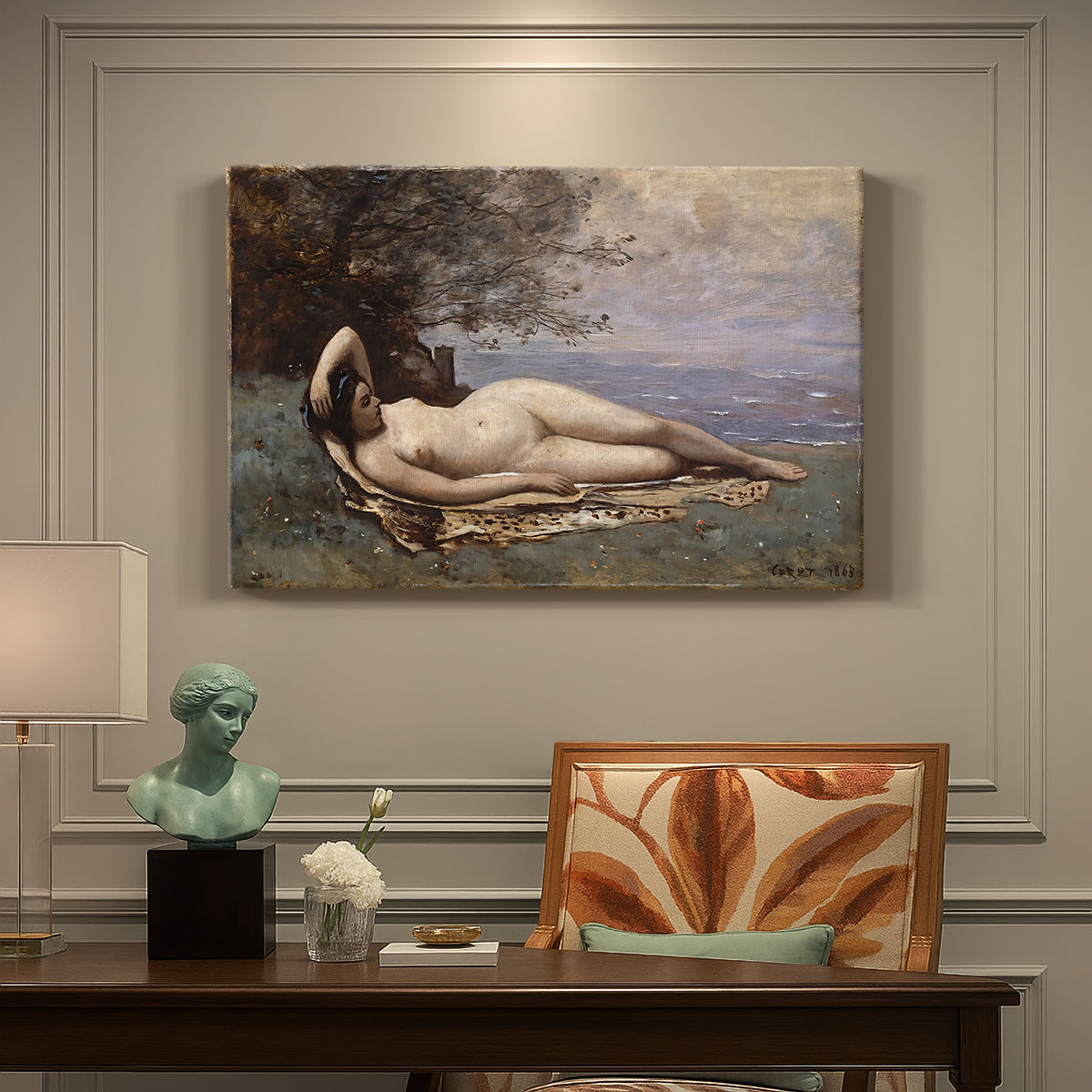 Canvas art print featuring a reclining female figure near shoreline with calm water behind, presented within a refined interior setting