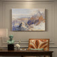 Canvas art print featuring a mountain pass with snow-covered peaks and expansive alpine valley, presented within a refined interior setting