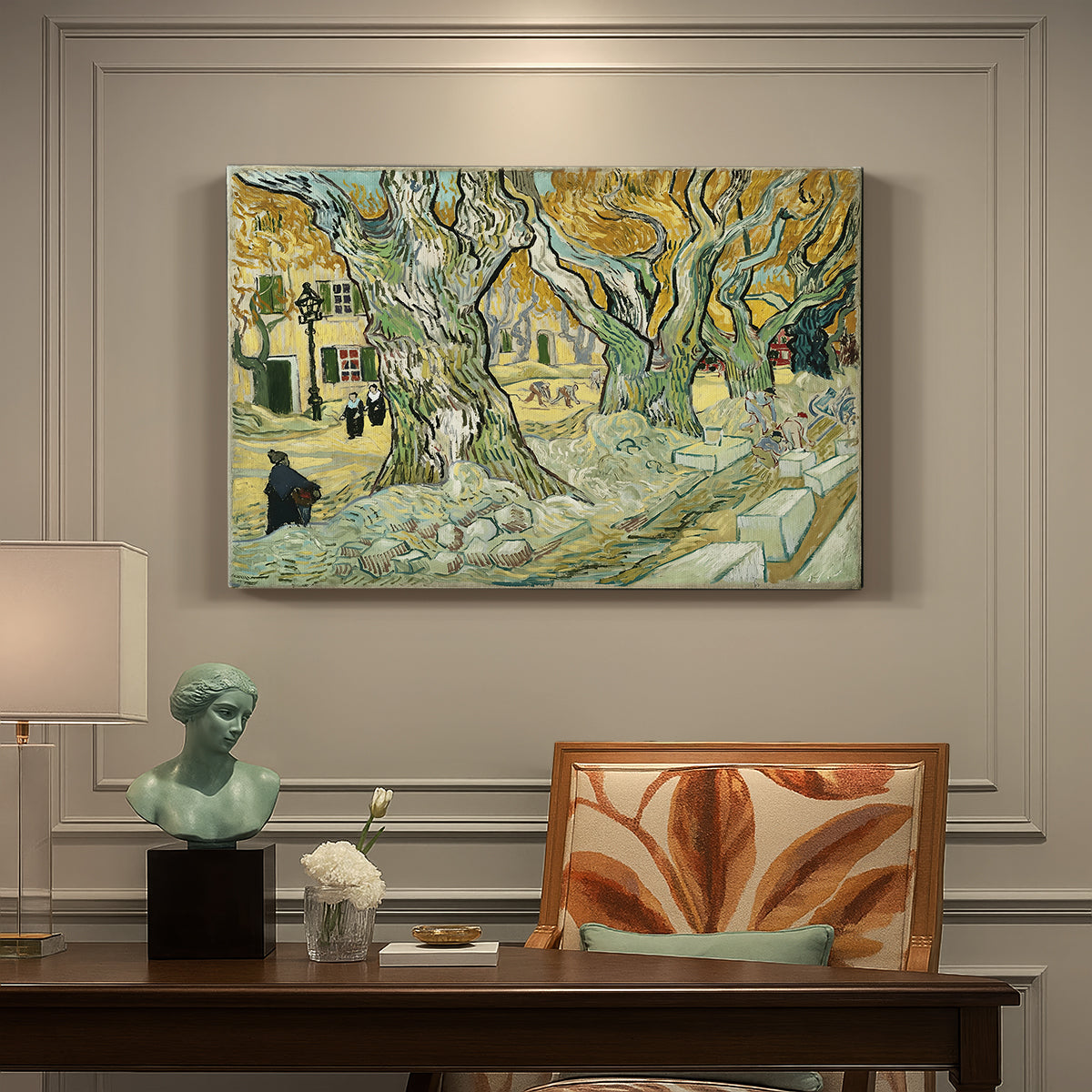 Canvas art print featuring a road lined with large trees where workers are gathered along path, presented within a refined interior setting