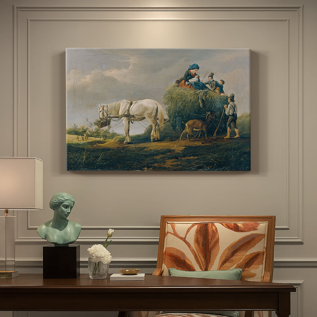 Canvas art print featuring a wagon carrying hay through countryside, presented within a refined interior setting
