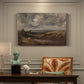 Canvas art print featuring an open heath landscape with low vegetation and expansive sky, presented within a refined interior setting