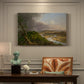 Canvas art print featuring a panoramic river landscape with contrast between stormy sky and calm farmland, presented within a refined interior setting