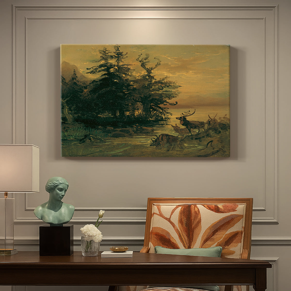 Canvas art print featuring deer near lakeshore with mountains behind, presented within a refined interior setting