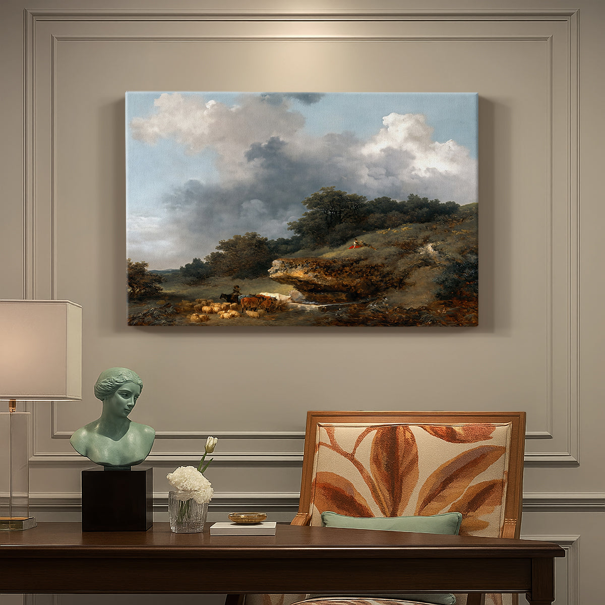 Canvas art print featuring a pastoral landscape with figures and animals gathered near water, presented within a refined interior setting