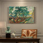 Canvas art print featuring an enclosed garden with trees and pathways rendered in vibrant brushwork, presented within a refined interior setting