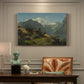 Canvas art print featuring a fjord landscape with mountains, water, and small settlement under open sky, presented within a refined interior setting