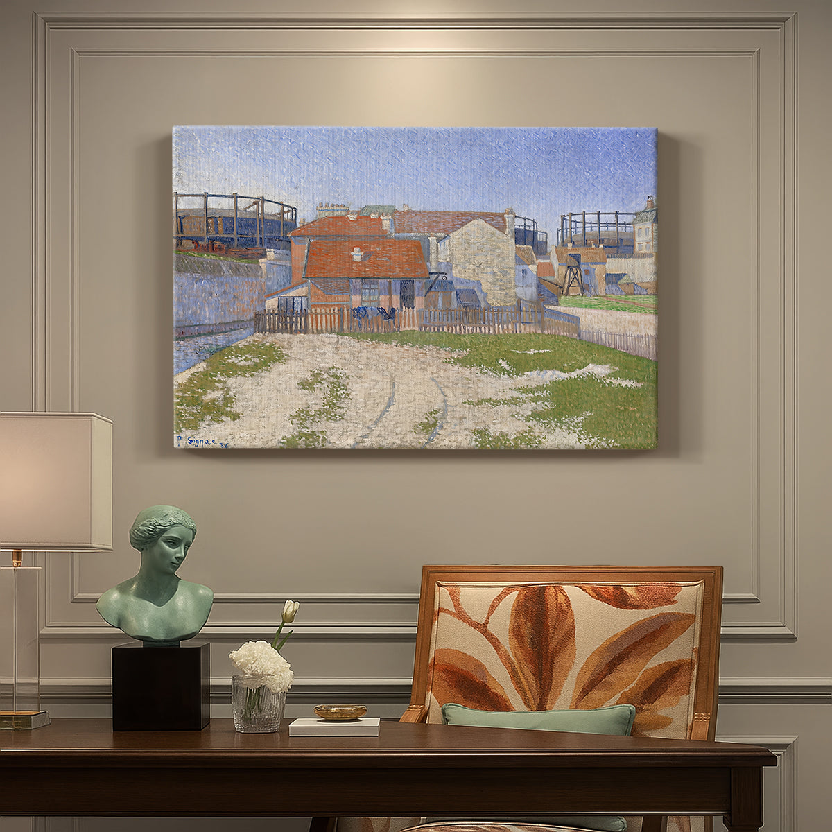 Canvas art print featuring industrial gas structures in urban landscape, presented within a refined interior setting