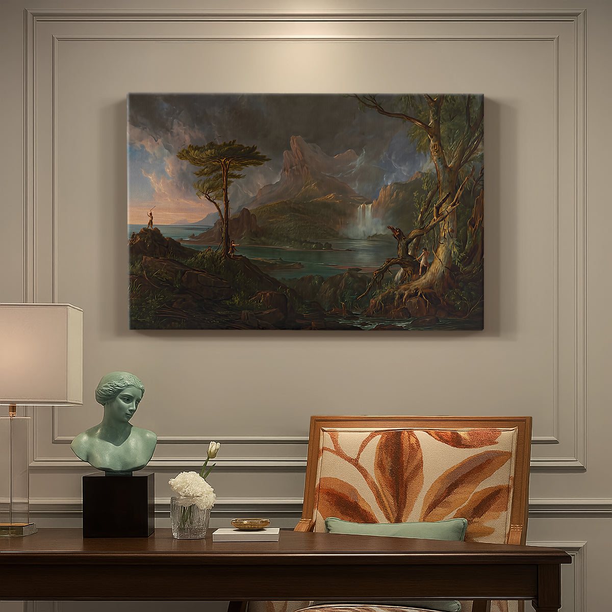 Canvas art print featuring a rugged natural landscape with dense trees and flowing water under dramatic sky, presented within a refined interior setting