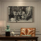 Canvas art print featuring two men seated at table playing chess in detailed interior setting, presented within a refined interior setting