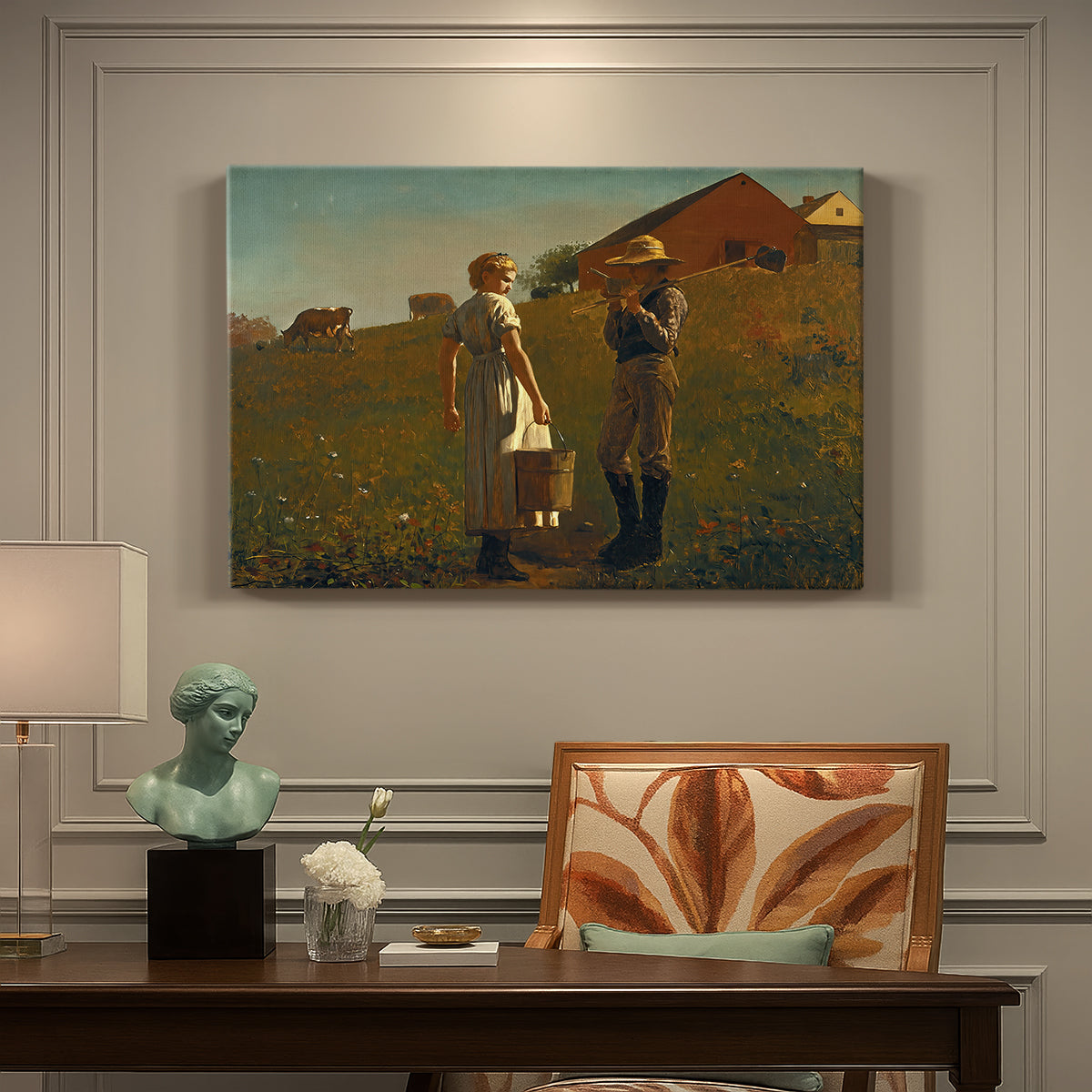Canvas art print featuring two figures standing in open field near small building under wide sky, presented within a refined interior setting