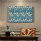 Canvas art print featuring a repeating floral pattern with tulip shapes in teal and neutral tones, presented within a refined interior setting