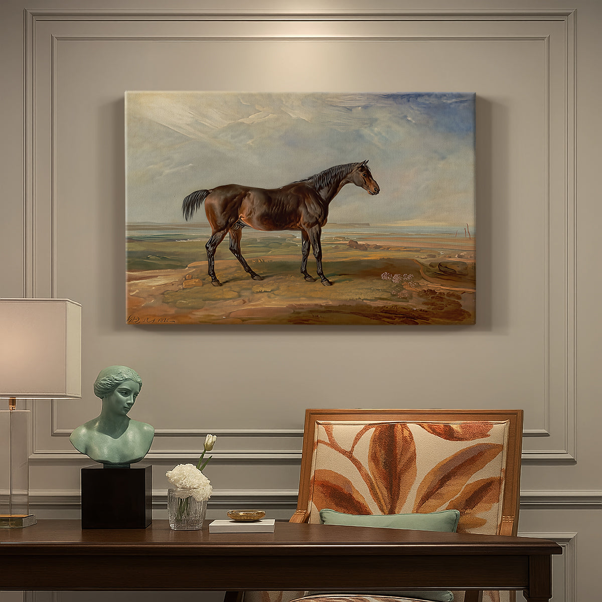 Canvas art print featuring a racehorse standing near coastal landscape with distant water, presented within a refined interior setting