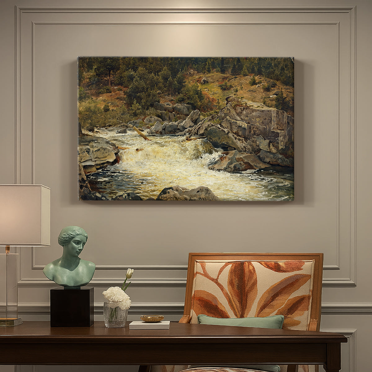 Canvas art print featuring a waterfall cascading down rocky slope surrounded by forest, presented within a refined interior setting