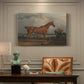 Canvas art print featuring a mounted hunter on horseback in open countryside landscape, presented within a refined interior setting