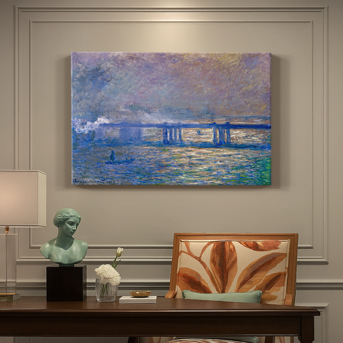 Canvas art print featuring an impressionist view of bridge stretching across river with soft light and haze, presented within a refined interior setting