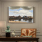 Canvas art print featuring a cityscape of Delft with buildings reflected in calm water, presented within a refined interior setting