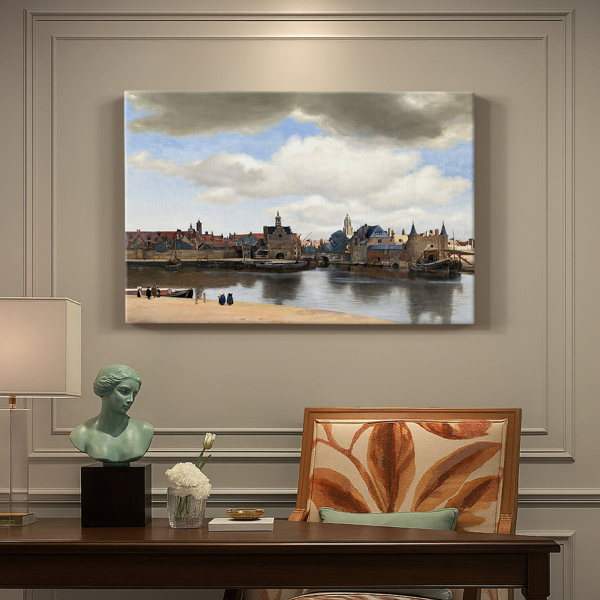 Canvas art print featuring a cityscape of Delft with buildings reflected in calm water, presented within a refined interior setting