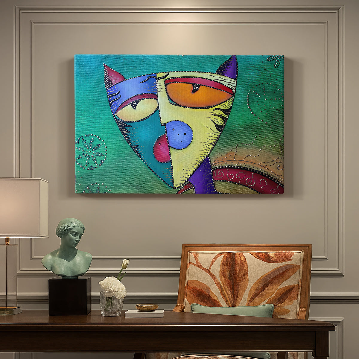 Canvas art print featuring a colorful geometric cat face with angular shapes, presented within a refined interior setting