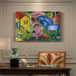 Canvas art print featuring an abstract composition of animals and figures intertwined in vivid dreamlike colors, presented within a refined interior setting