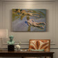 Canvas art print featuring young boys running and playing along shoreline in sunlight, presented within a refined interior setting