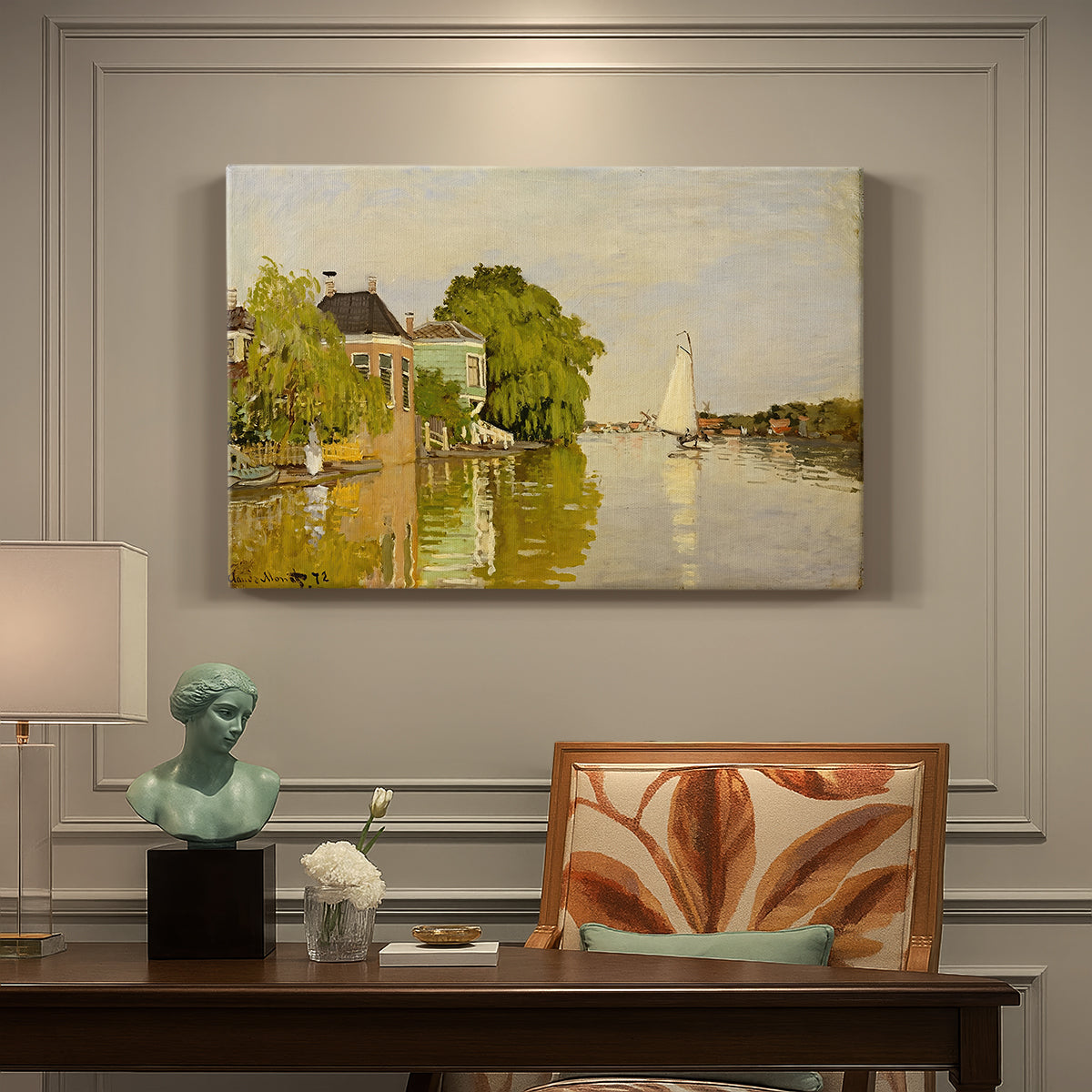 Canvas art print featuring colorful houses reflected in calm river surrounded by greenery, presented within a refined interior setting