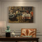 Canvas art print featuring a group of people seated around table sharing meal in interior, presented within a refined interior setting