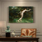 Canvas art print featuring a nude female figure standing in natural setting, presented within a refined interior setting