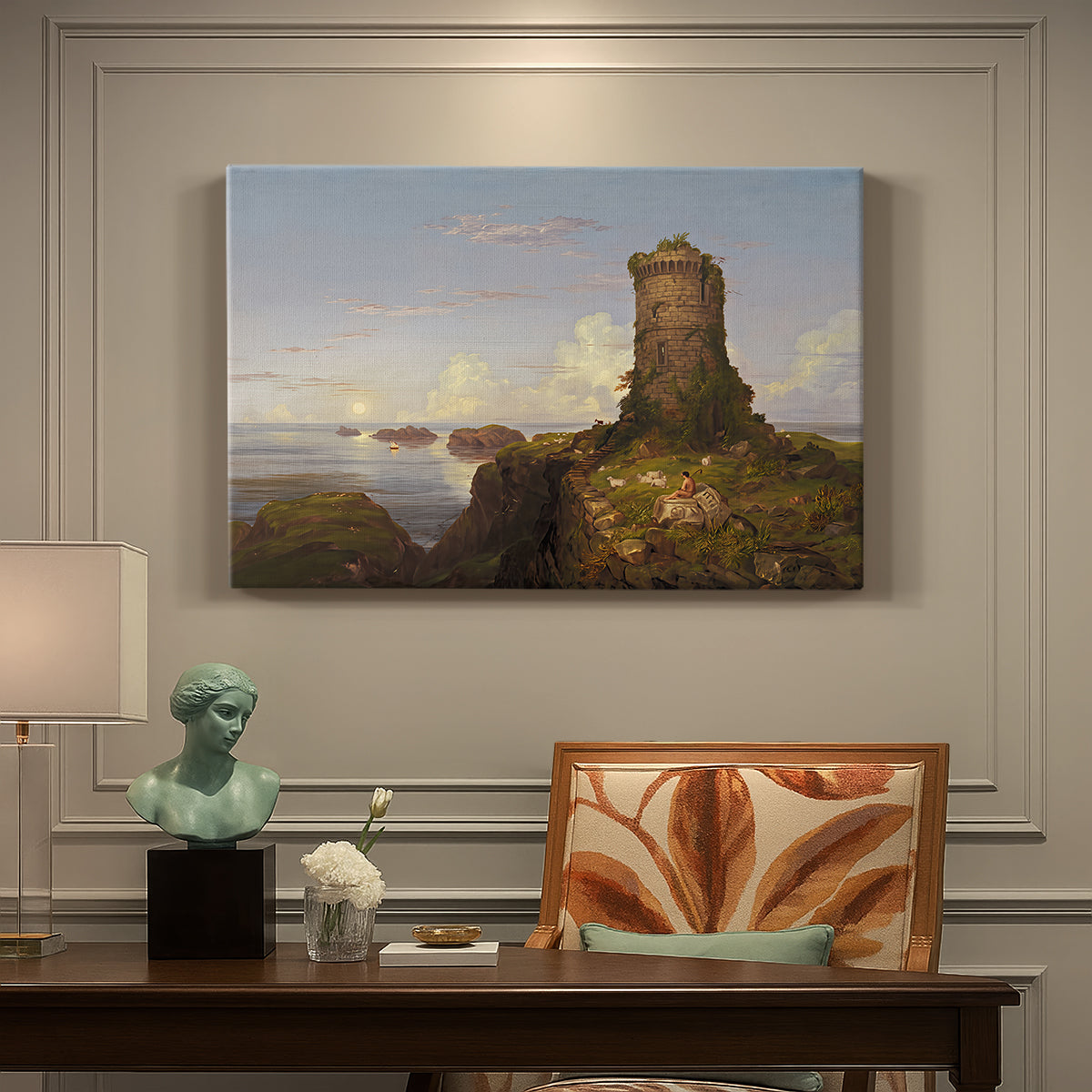 Canvas art print featuring a coastal landscape with ruined tower overlooking sea, presented within a refined interior setting
