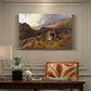 Canvas art print featuring an expansive valley landscape with river flowing through rugged hills, presented within a refined interior setting
