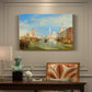 Canvas art print featuring a Venetian waterfront with boats and iconic buildings, presented within a refined interior setting