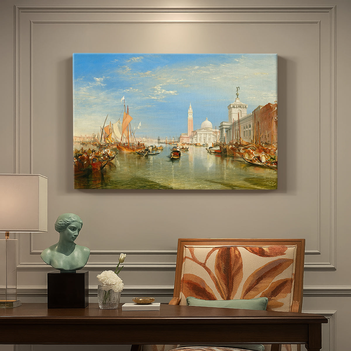 Canvas art print featuring a Venetian waterfront with boats and iconic buildings, presented within a refined interior setting