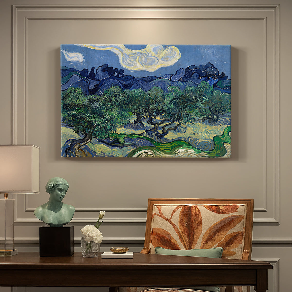 Canvas art print featuring an olive grove with twisted trees set before distant mountain range, presented within a refined interior setting