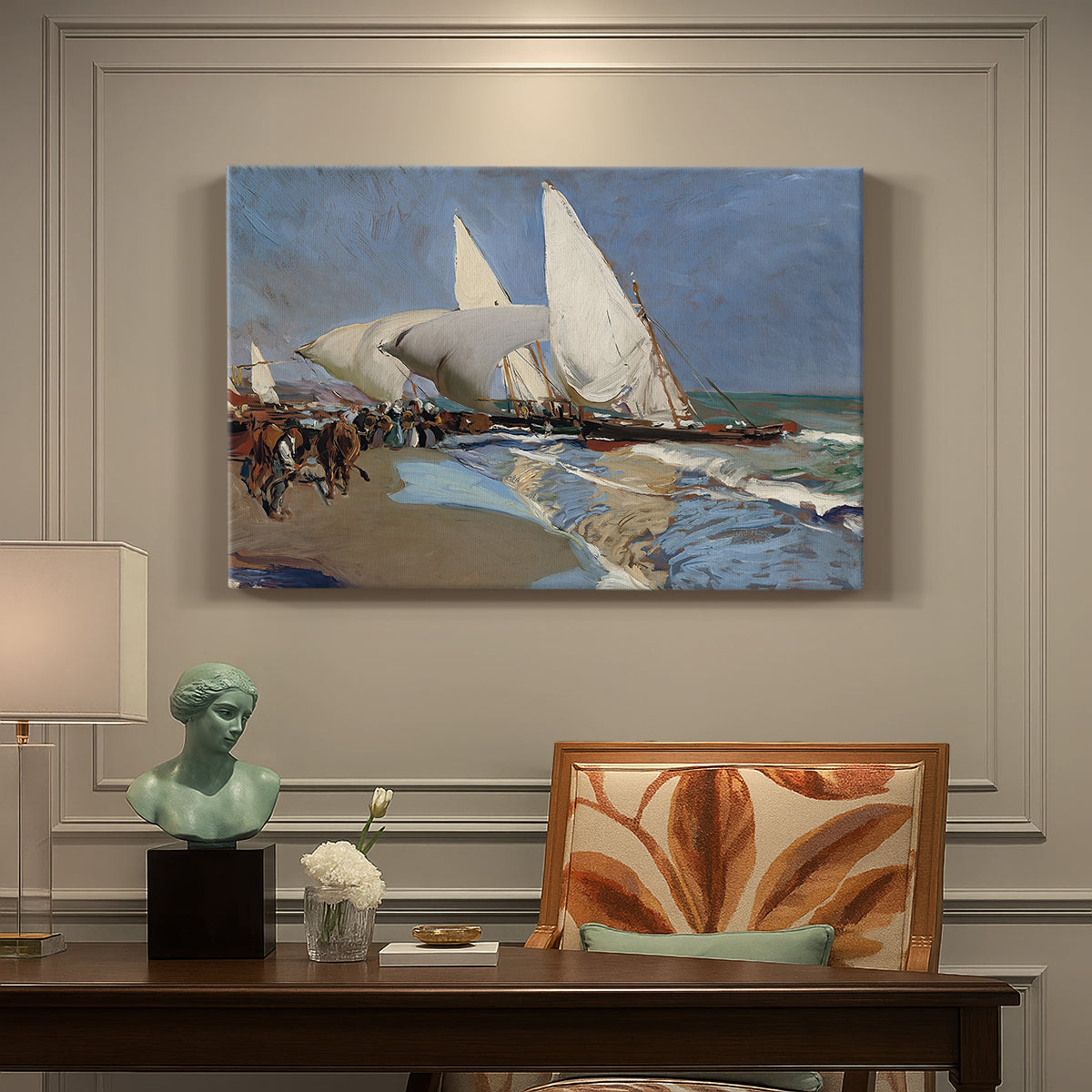 Canvas art print featuring boats and figures gathered along busy beach with sails and water, presented within a refined interior setting