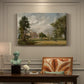 Canvas art print featuring a country house surrounded by trees in landscaped grounds, presented within a refined interior setting