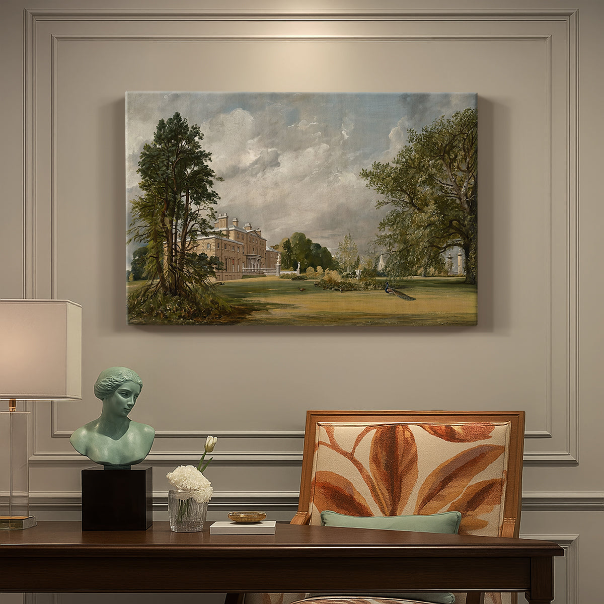 Canvas art print featuring a country house surrounded by trees in landscaped grounds, presented within a refined interior setting
