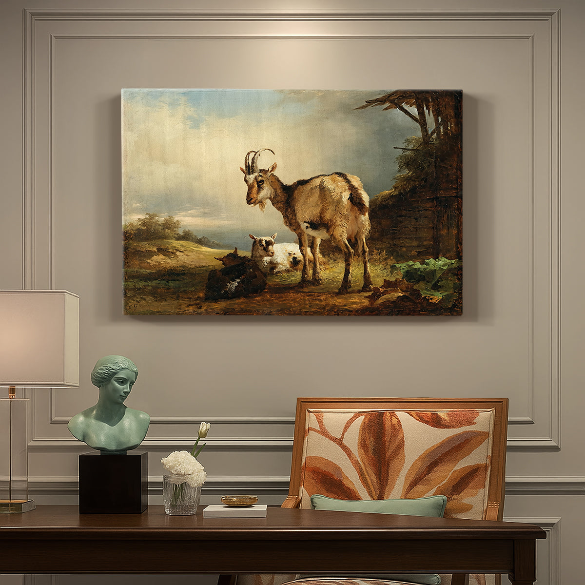 Canvas art print featuring a goat with young kids in countryside, presented within a refined interior setting